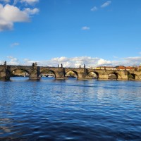 The medieval Charles Bridge crosses the Vltava River. Prague.